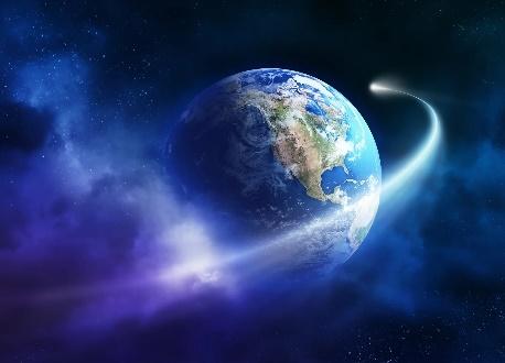 Earth in space with glowing comet trail