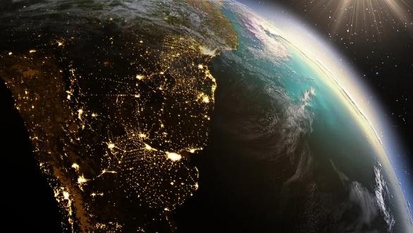 Earth from space with illuminated city lights