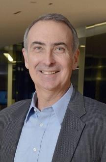 Smiling professional man wearing blazer