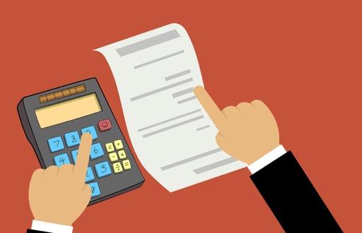 Hands using calculator to check a bill