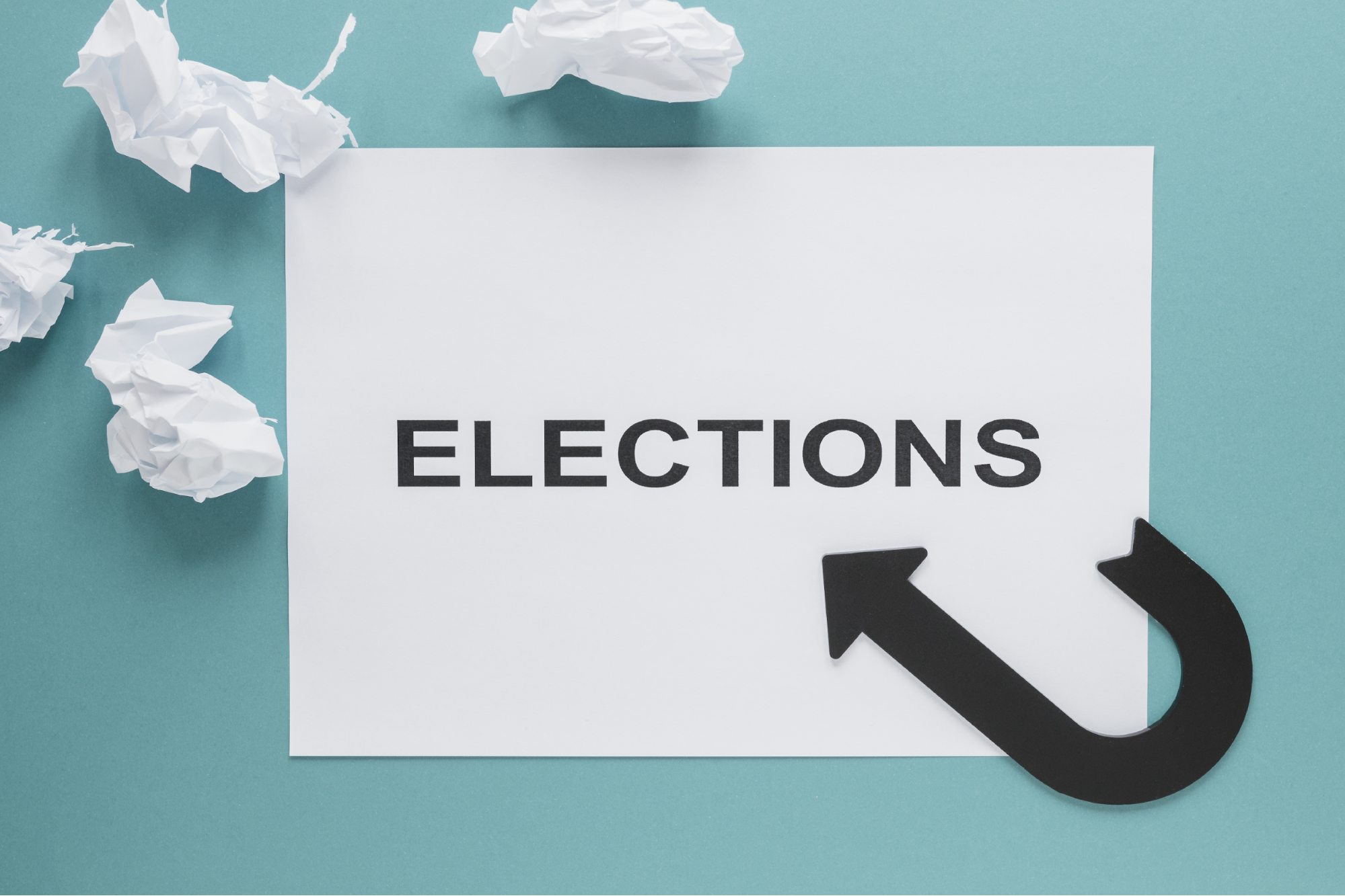Blank ballot labeled ELECTIONS with directional arrows