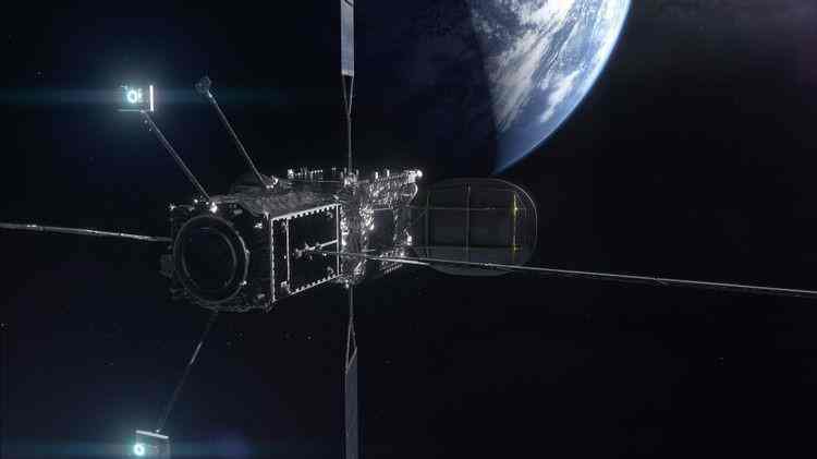 A satellite orbiting Earth with its solar panels extended.