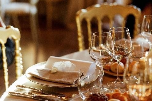 Elegant table setting with wine glasses and plates