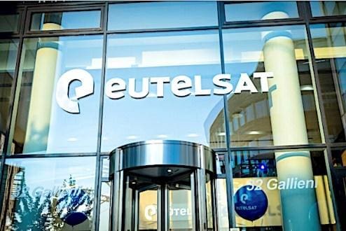 Eutelsat logo on glass building entrance