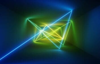 Abstract neon geometric shapes glowing in blue and green hues.