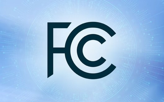FCC logo on a blue digital background.