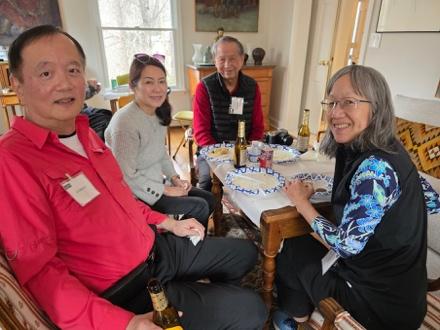 Group of people sitting at a table.