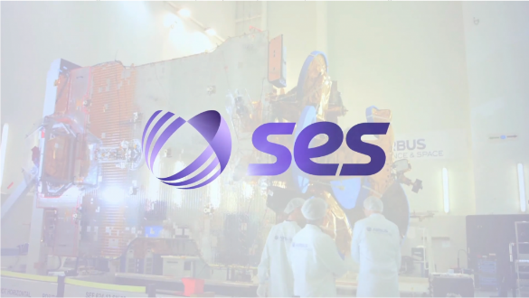 Purple SES emblem overlaying satellite assembly