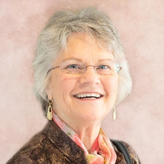 Smiling woman in scarf and earrings