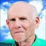 Portrait of older man against blue sky