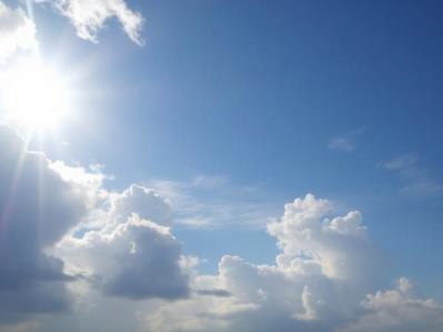 Sunny blue sky with white clouds