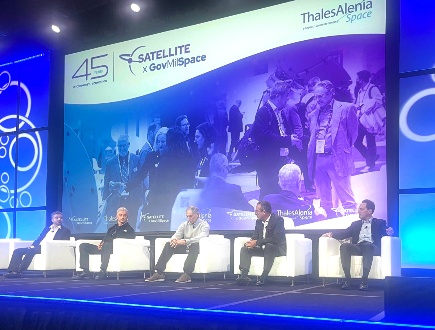 Panel discussion at satellite industry conference event.