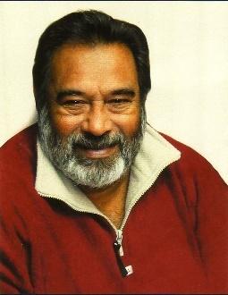 Smiling older man with gray beard