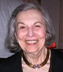 Smiling older woman wearing gold choker necklace
