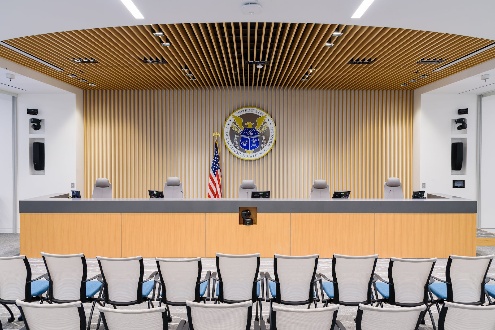 Image credit:</strong>
  <a href="https://www.satellitetoday.com/" target="_blank" rel="noopener noreferrer">
    Via Satellite
  </a>:
 The FCC meeting room. Photo: FCC